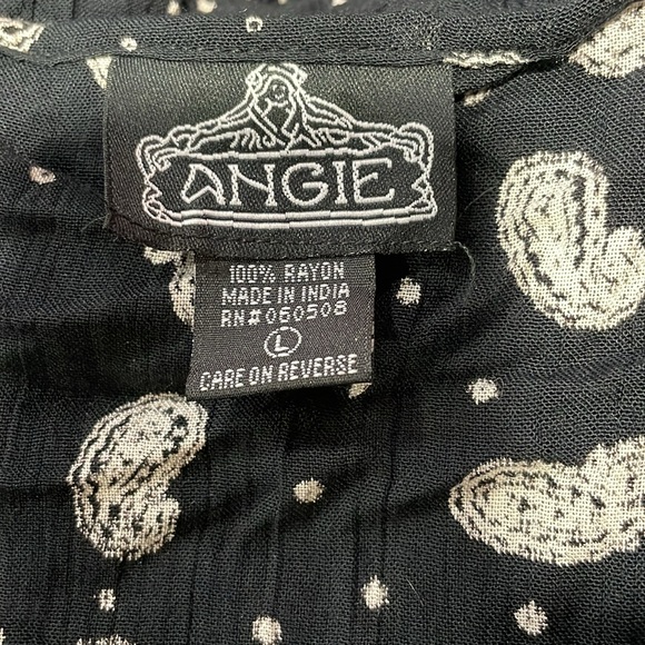 Ladies black and cream paisley and polka dot top with bell sleeves. - Picture 5 of 6